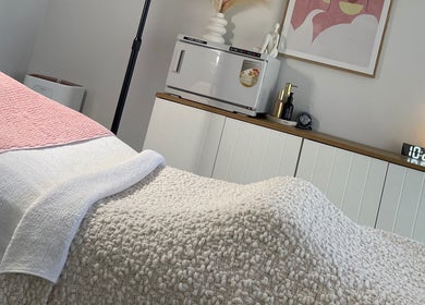 Cozy treatment room at Pure Bliss Skin Body and Beauty, Kinross, Western Australia, AU, featuring a plush massage table.