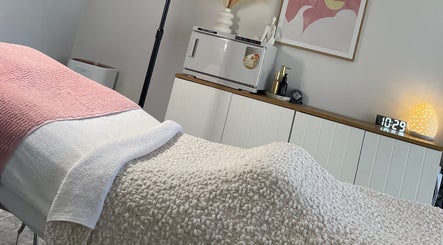 Cozy treatment room at Pure Bliss Skin Body and Beauty, Kinross, Western Australia, AU, featuring a plush massage table.