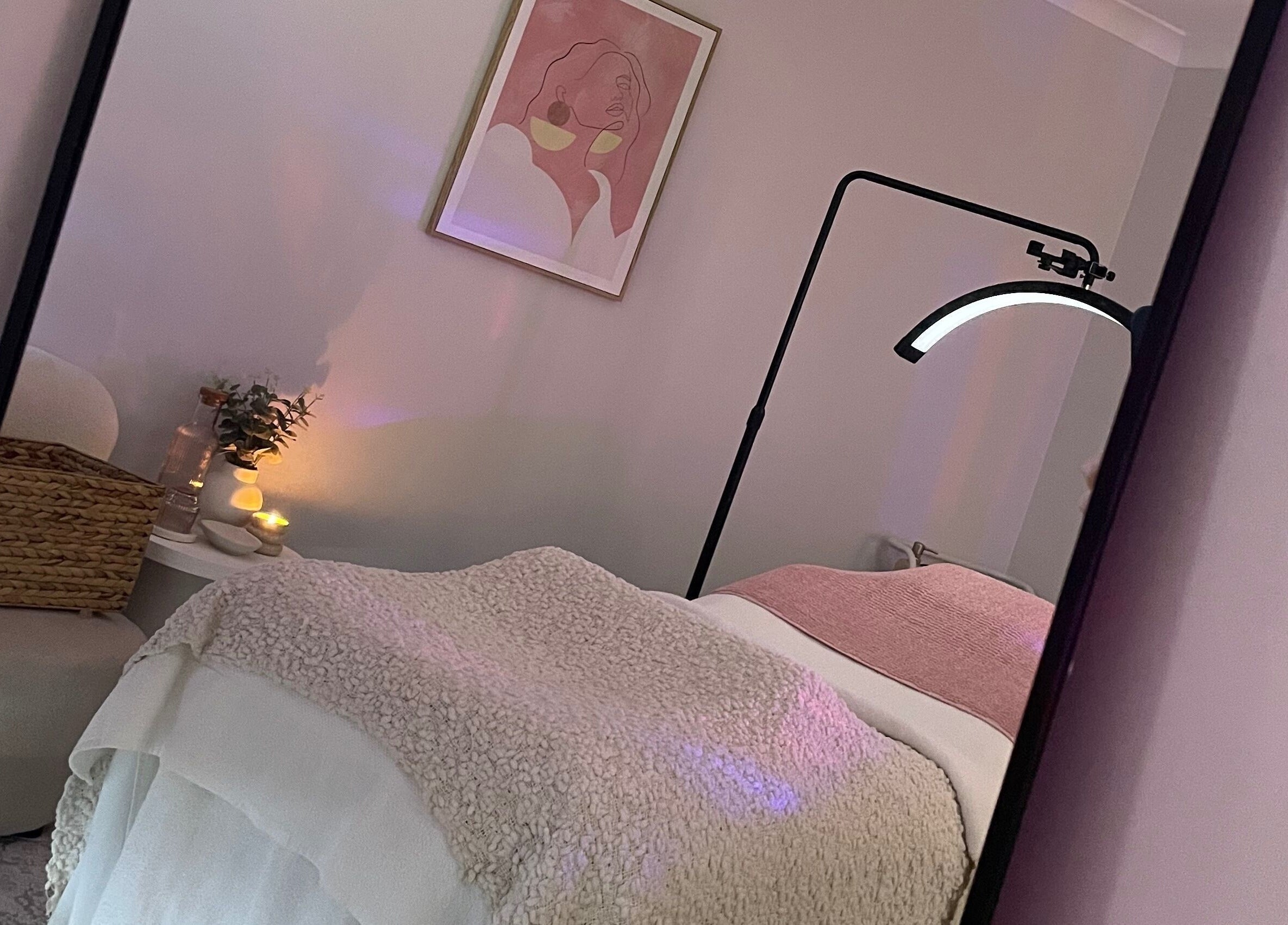 Cozy treatment room at Pure Bliss Skin Body And Beauty, Kinross, Western Australia, AU, featuring warm lighting and decor.