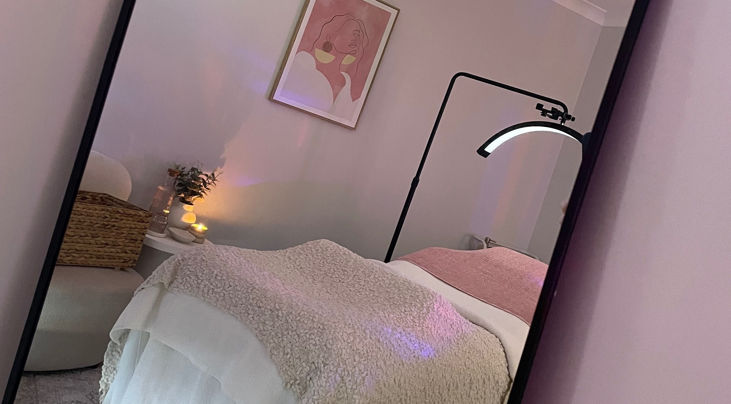 Cozy treatment room at Pure Bliss Skin Body And Beauty, Kinross, Western Australia, AU, featuring warm lighting and decor.
