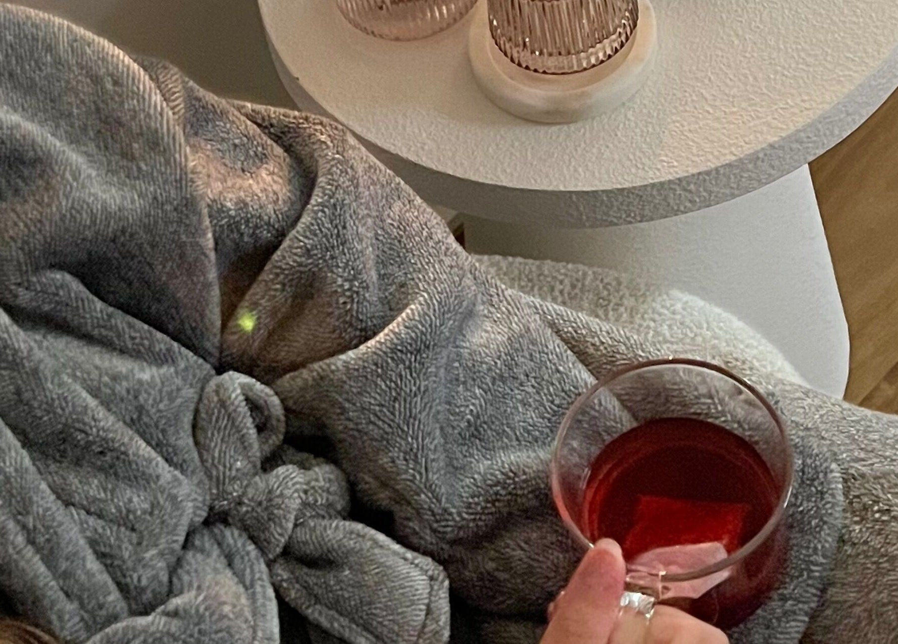 Relaxing with tea at Pure Bliss Skin Body And Beauty, Kinross, Western Australia, AU in a soft blanket.