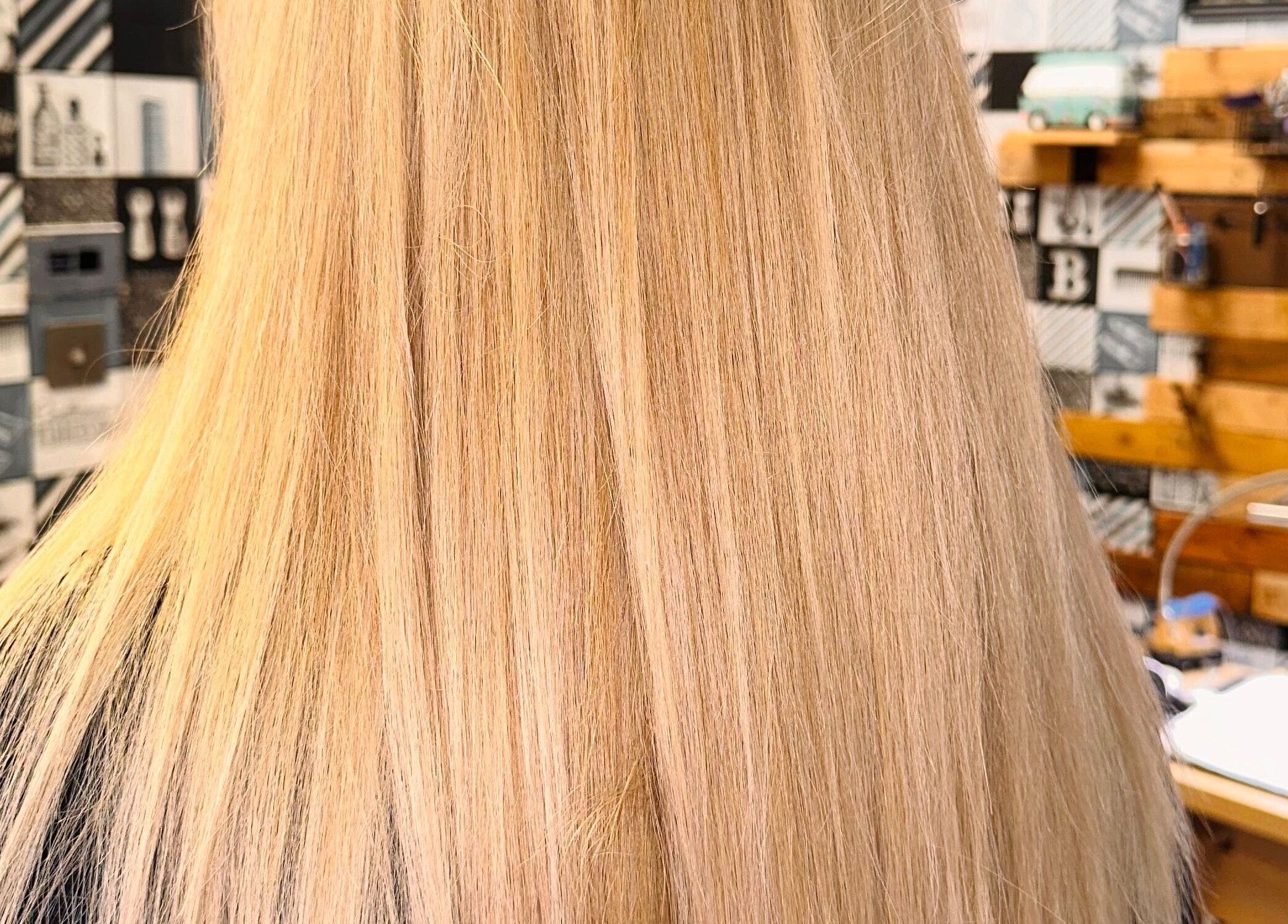 Straight blonde hair at Nublow Ltd, Thornton-cleveleys, England, GB, showcasing sleek salon style.