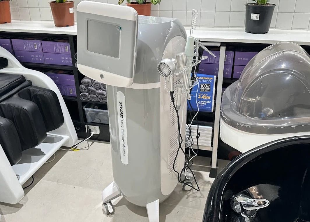 Advanced hair treatment machine at G.L..HAIR SALON, Burwood, New South Wales, AU, enhancing salon offerings.