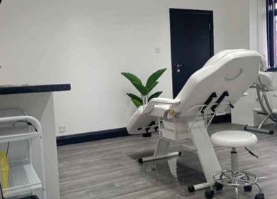 Treatment room at Solace Health and Beauty, Weston-super-mare, England, GB. Features a reclining chair and serene decor.