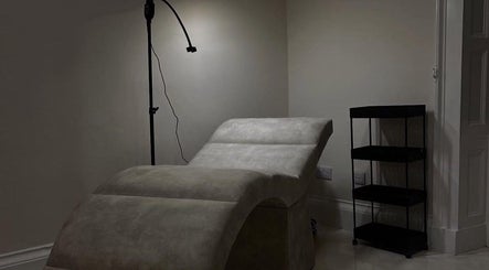 Cozy treatment chair and shelving in Faces by Flo, Aberdeen, Scotland, GB beauty room.