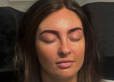 Woman with well-defined eyebrows at TBM Studio, Bolton, England, GB.