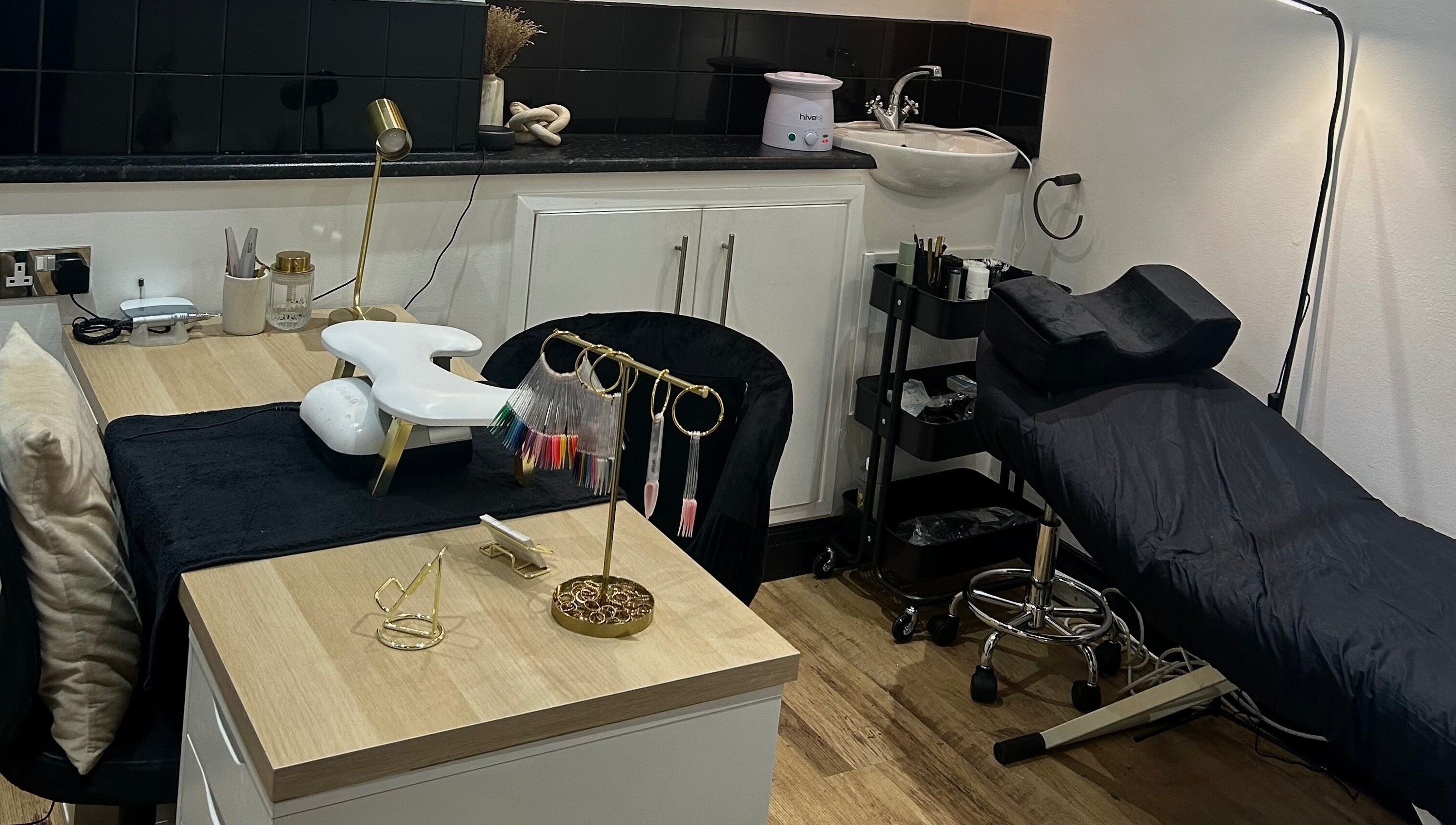 Elegant beauty station at TBM Studio, Bolton, England, GB featuring modern decor and nail tools.