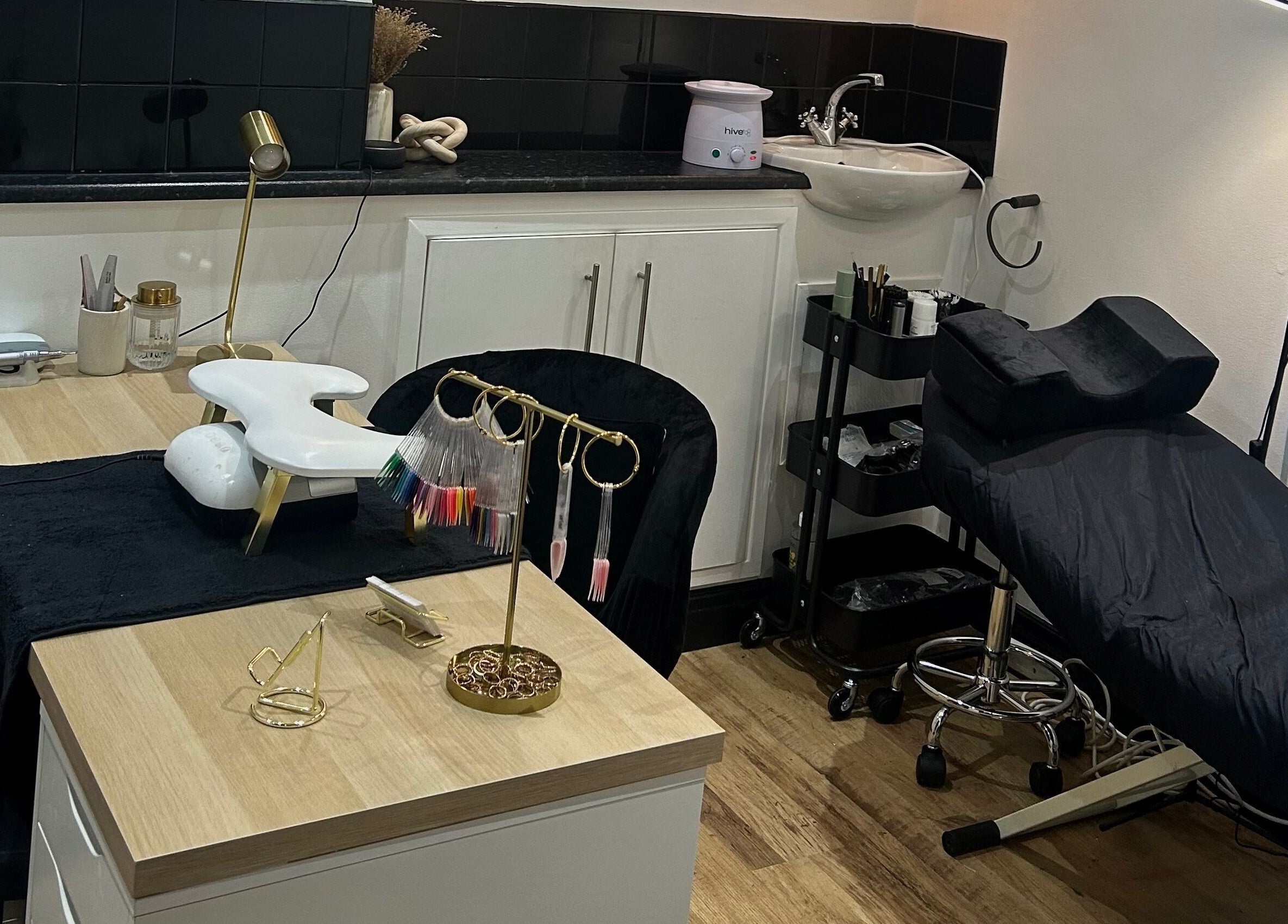 Elegant beauty station at TBM Studio, Bolton, England, GB featuring modern decor and nail tools.
