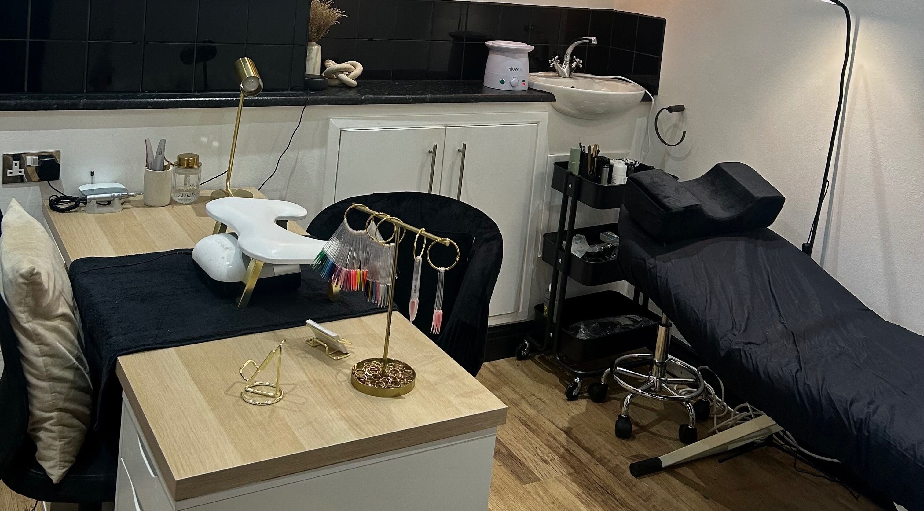 Elegant beauty station at TBM Studio, Bolton, England, GB featuring modern decor and nail tools.
