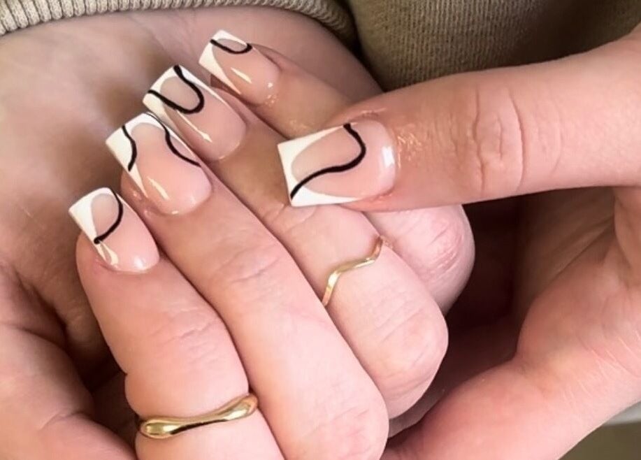 Stylish black and white nail art at TBM Studio, Bolton, England, GB. Perfectly manicured hands.