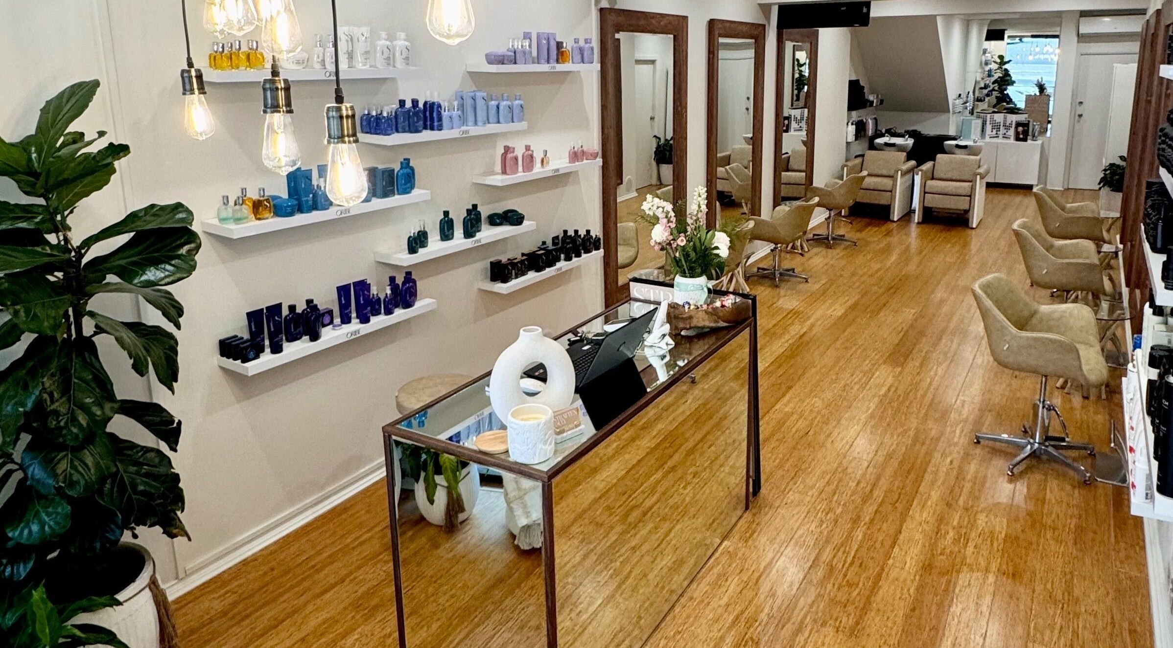 Chic interior of Stratten & Co, Burraneer, New South Wales, AU showcasing product displays and cozy seating.