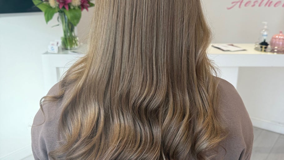 Smooth, flowing hair styled at Hair by Harriet in Nuneaton, England, GB.