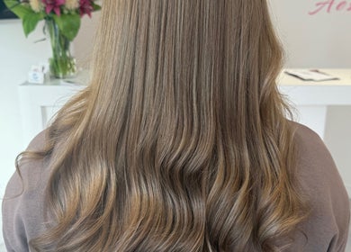 Smooth, flowing hair styled at Hair by Harriet in Nuneaton, England, GB.