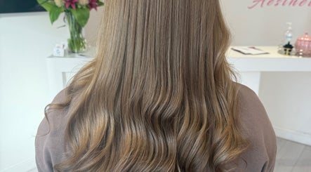 Smooth, flowing hair styled at Hair by Harriet in Nuneaton, England, GB.