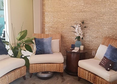 Comfortable lounge chairs at The Compass Spa Therapy & Wellbeing in Tampa, Florida, US, exude relaxation.