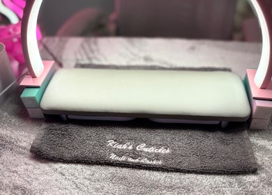 Nail station setup at Clarissa's Beauty Boutique, March, England, GB, featuring stylish tools and lighting.