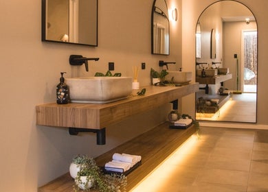 Elegant bathroom at My Recovery Lounge, Port Melbourne Beach, Victoria, AU, featuring warm lighting and modern fixtures.
