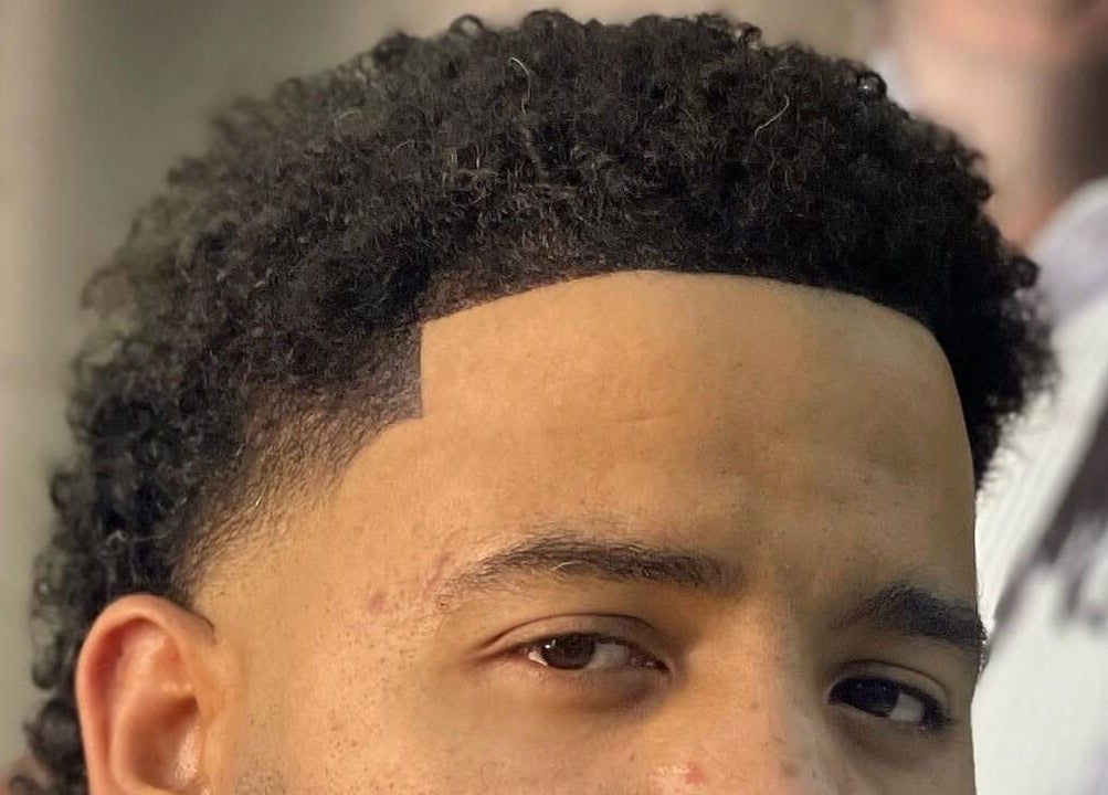 Crisp fade haircut at Georgekutz Hair Studio in Seeb, Muscat Governorate, OM showcasing perfect styling.