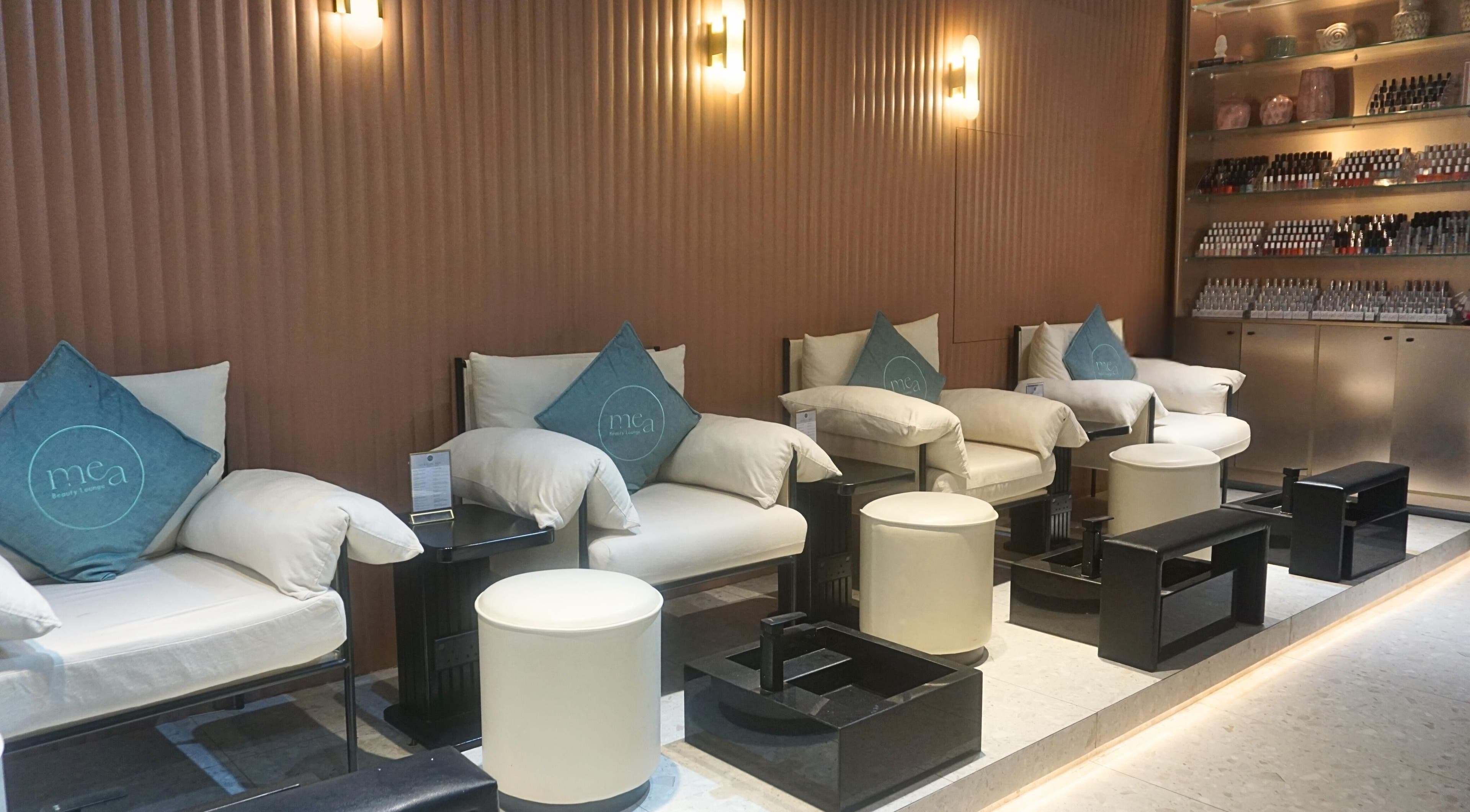 Relaxing seating area at mea Beauty Lounge - Jumeirah Golf Estates, Dubai, Dubai, AE, with elegant decor.