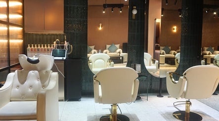 Chic interior of mea Beauty Lounge - Jumeirah Golf Estates, Dubai, Dubai, AE, featuring stylish salon chairs.