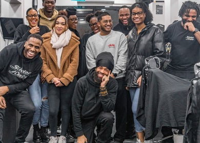 Group of people smiling in SliderCuts - Black Eats Fest, London, England, GB, capturing joyful moments.