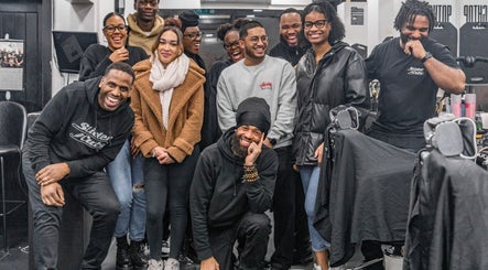 Group of people smiling in SliderCuts - Black Eats Fest, London, England, GB, capturing joyful moments.