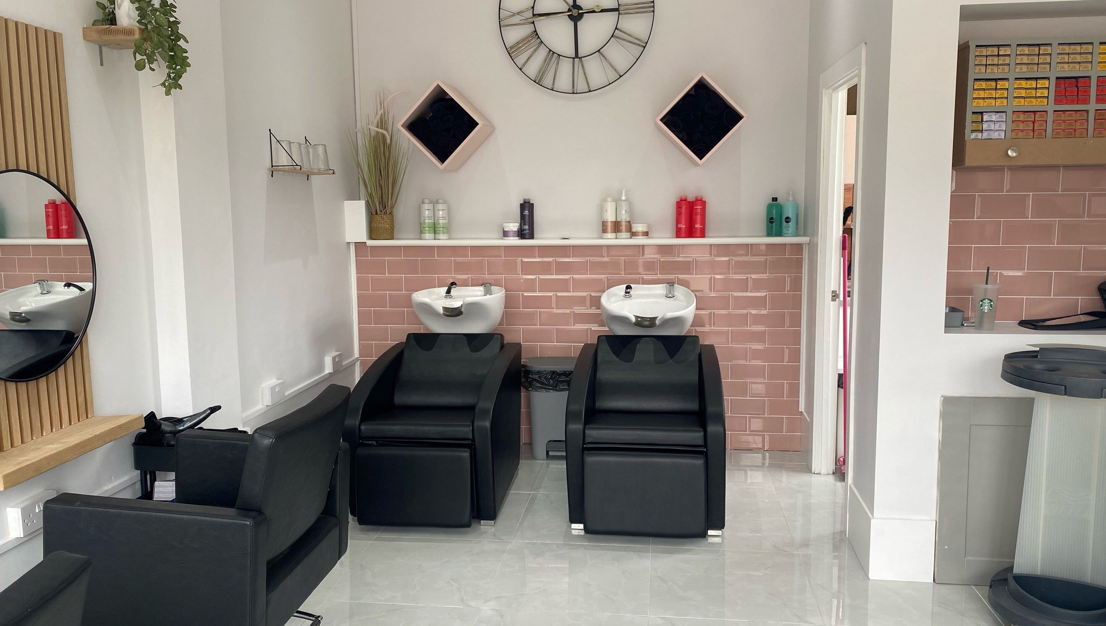 Elegant wash stations at Blended, Canvey Island, England, GB, with modern decor and stylish seating.