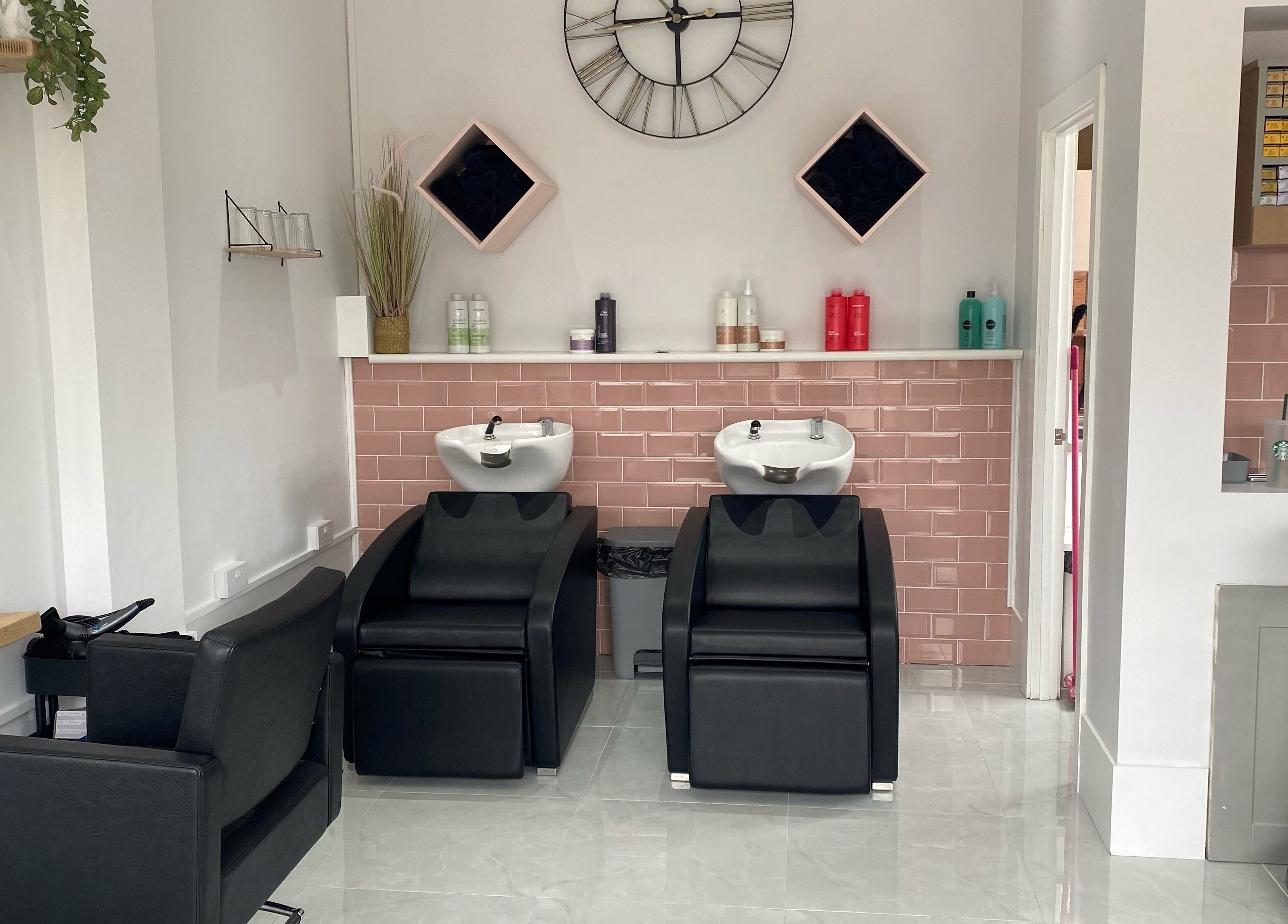 Elegant wash stations at Blended, Canvey Island, England, GB, with modern decor and stylish seating.