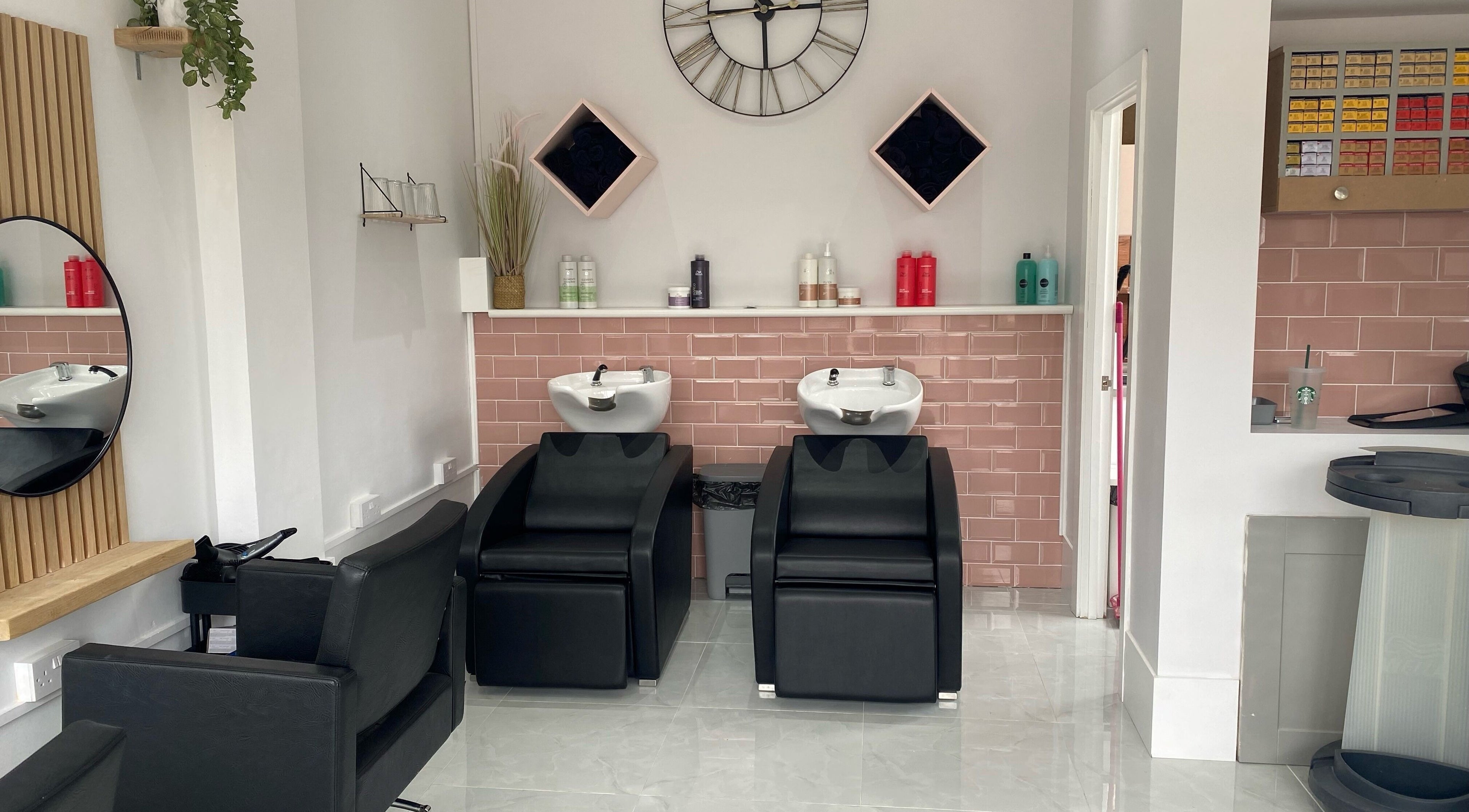 Elegant wash stations at Blended, Canvey Island, England, GB, with modern decor and stylish seating.