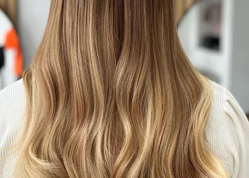Smooth, golden blonde hair styled at Blended, Canvey Island, England, GB salon.