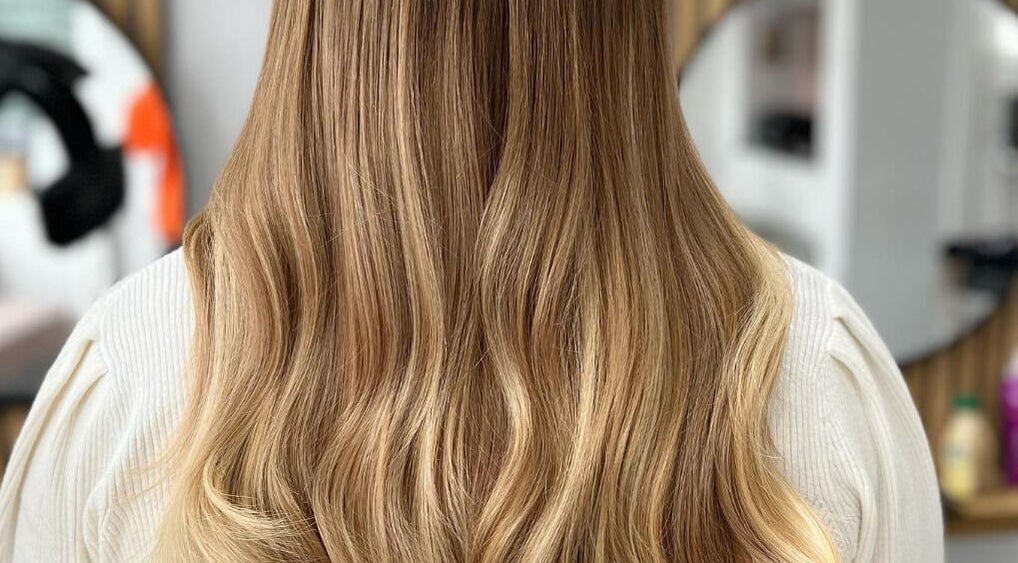 Smooth, golden blonde hair styled at Blended, Canvey Island, England, GB salon.
