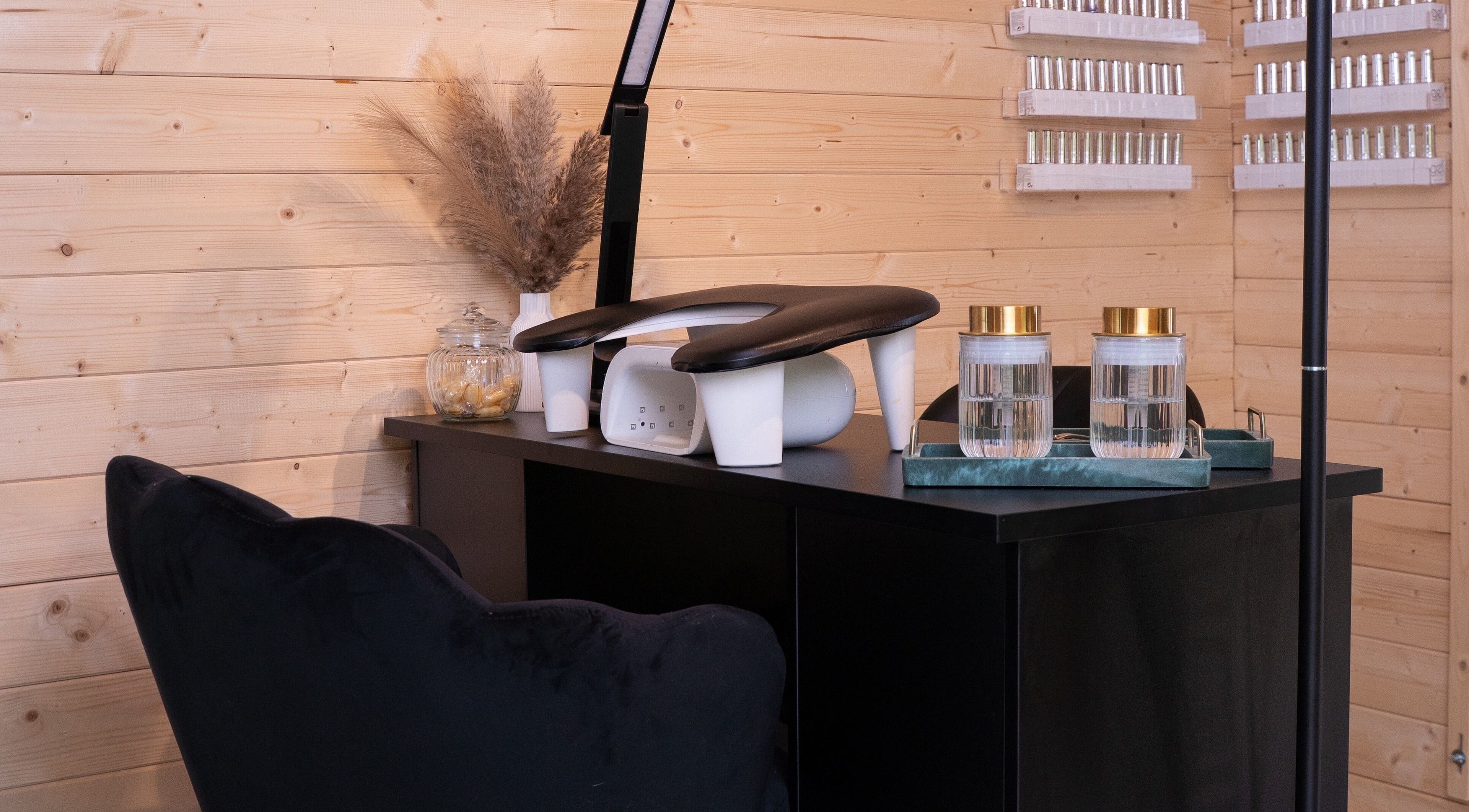 Elegant nail station at Allure Prestige Beauty, Worsley, England, GB. Features cozy decor and professional setup.
