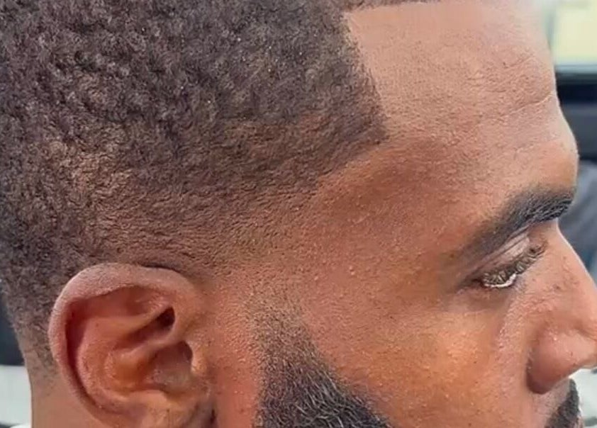 Sharp haircut at Another Level Barbershop in Baldwin, New York, US showcasing expert styling.