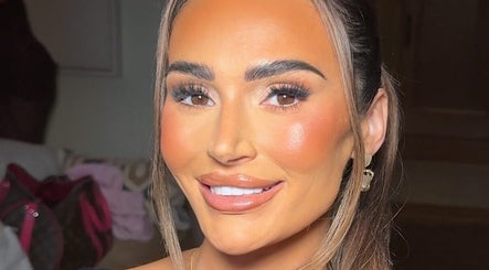 Elegant makeup by Robyn Martin in Sidcup, GB, showcasing flawless skin and defined brows.