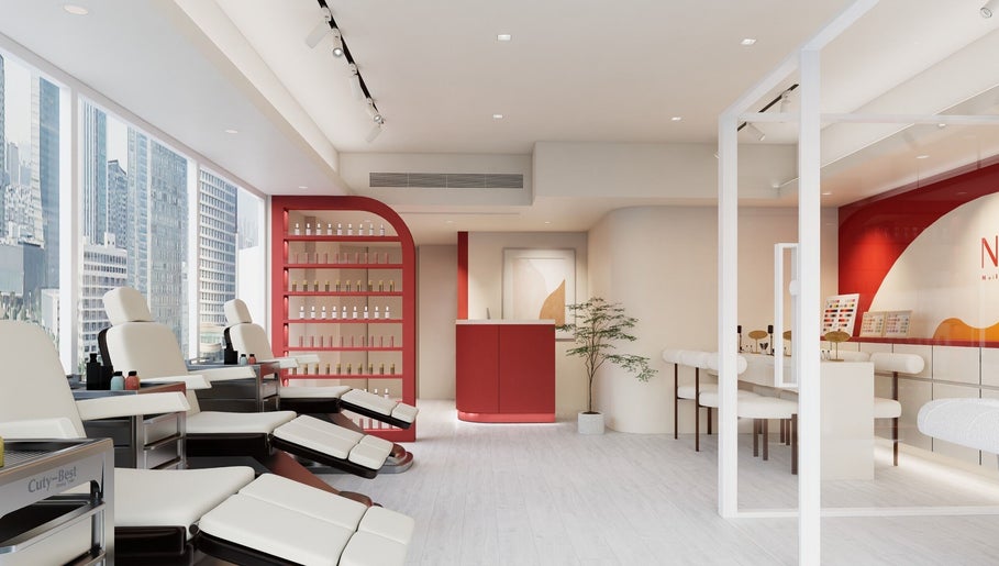 Modern interior of Nica Beauty, Hong Kong Island, HK, with sleek seating and city view.