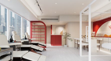 Modern interior of Nica Beauty, Hong Kong Island, HK, with sleek seating and city view.