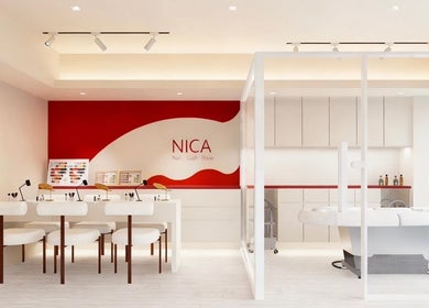 Modern interior of Nica Beauty on Hong Kong Island, featuring stylish nail stations and elegant decor.