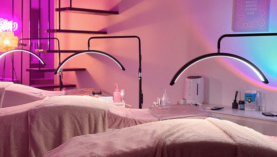Cozy eyelash extension room at The Lashery KL, Petaling Jaya, Selangor, MY with ambient lighting and comfy beds.