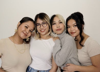 Smiling team members at The Lashery KL in Petaling Jaya, Selangor, MY, radiating warmth and expertise.
