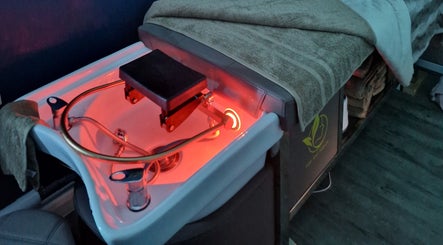 Heated spa bed at Aura10 in Long Hanborough, GB, ready for wellness treatments.