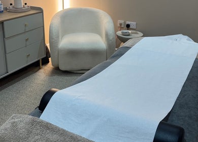 Massage table setup in a cozy room at Revival Wellbeing, Thurso, Scotland, GB.
