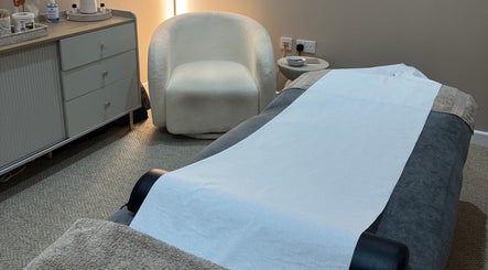 Massage table setup in a cozy room at Revival Wellbeing, Thurso, Scotland, GB.