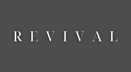 Sophisticated Revival Wellbeing signboard in Thurso, Scotland, GB, featuring elegant white font on gray background.