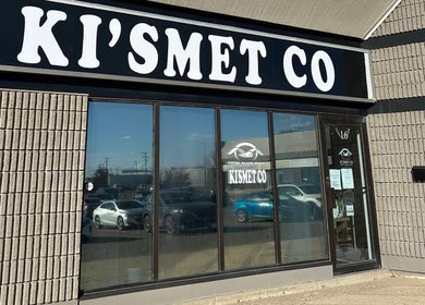 Exterior of Jolene Funk RMT in Saskatoon, Saskatchewan, CA with prominent Kismet Co sign.