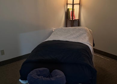 Tranquil massage room at Jolene Funk RMT in Saskatoon, Saskatchewan, CA, featuring a comfortable massage table.
