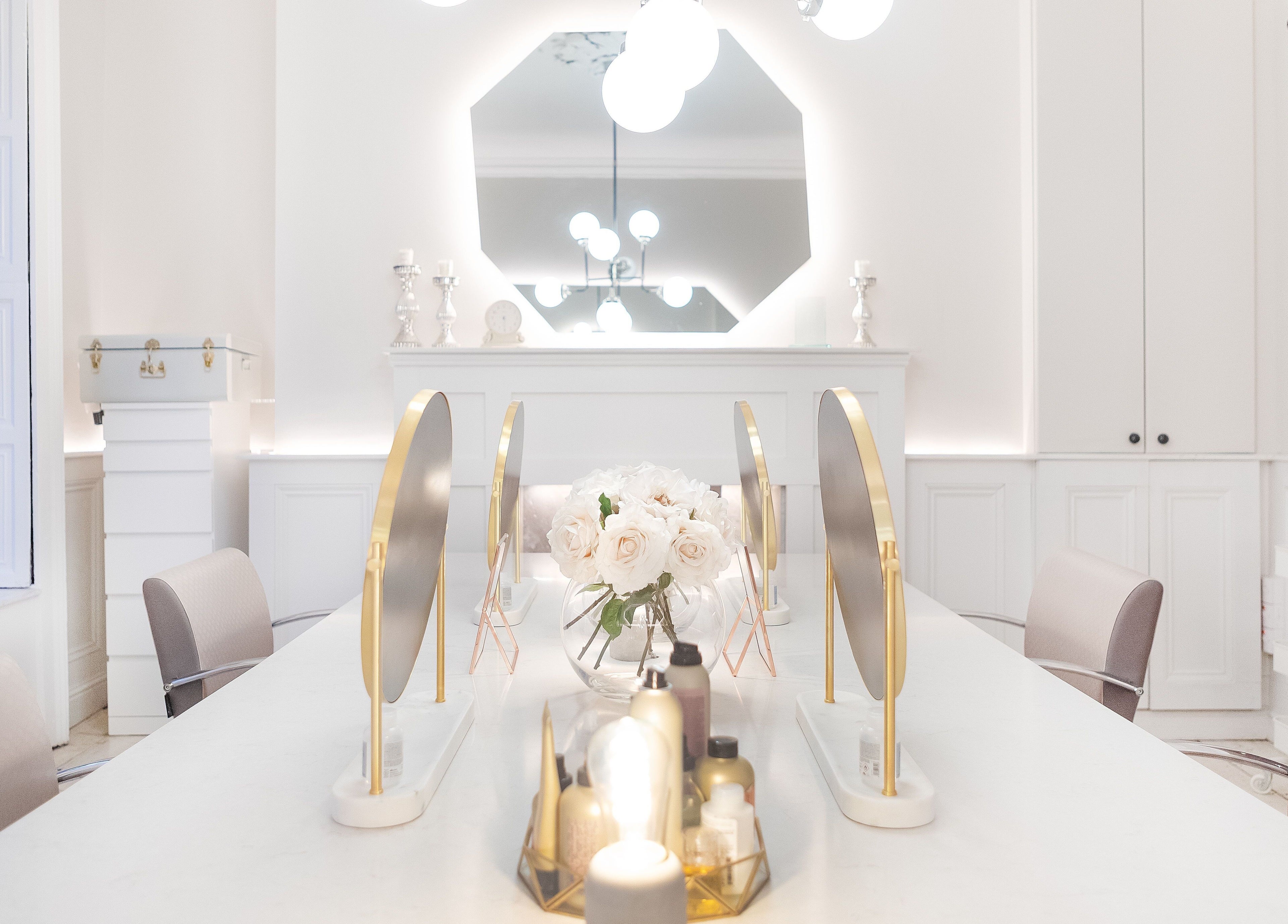 Chic interior of Bozena Sarek Hairdressing Dublin with stylish mirrors and floral decor in Dublin, County Dublin, IE.