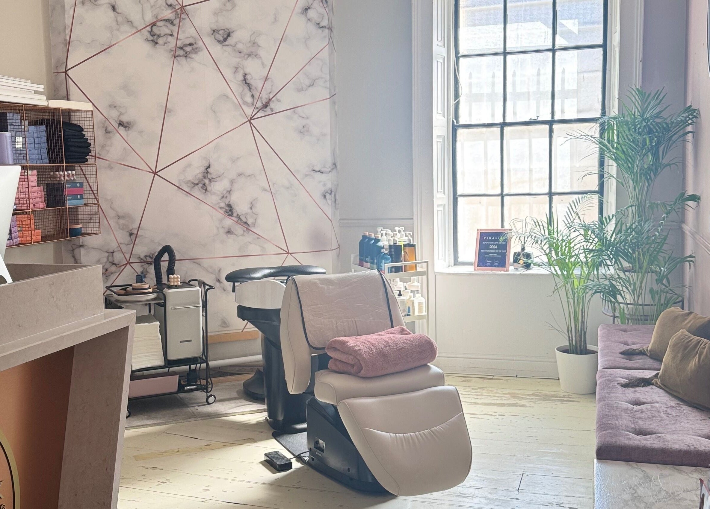 Bozena Sarek Hairdressing Dublin offers a chic salon interior with modern styling chairs and elegant decor in Dublin, County Dublin, IE.