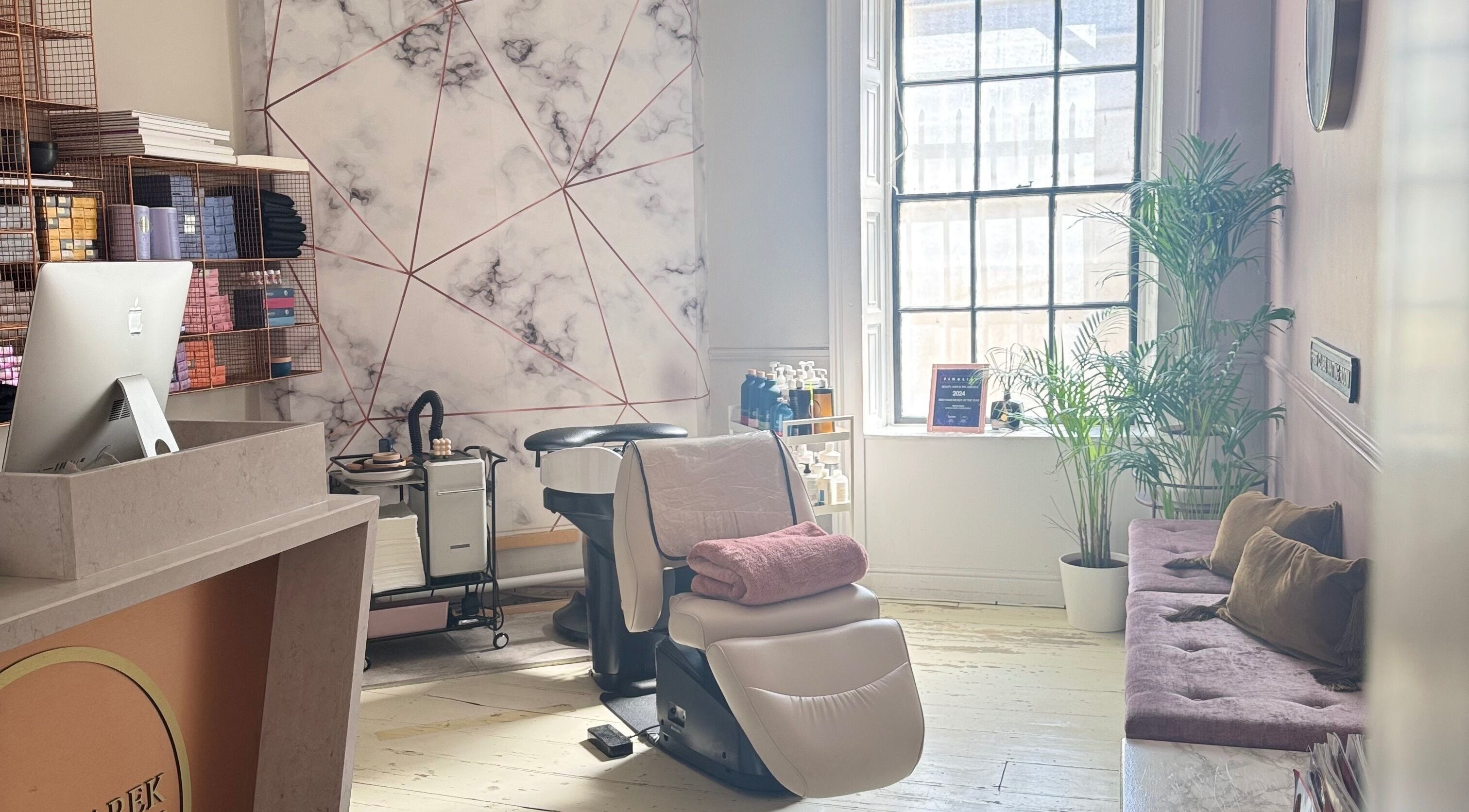 Bozena Sarek Hairdressing Dublin offers a chic salon interior with modern styling chairs and elegant decor in Dublin, County Dublin, IE.