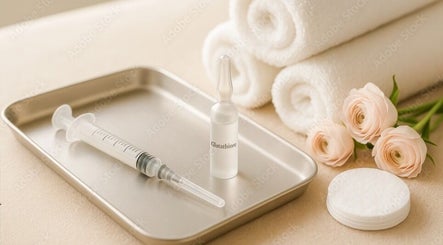 IV essentials at IV DRIP LOUNGE BY SHAR, Walthamcross, England, GB with roses and towels.