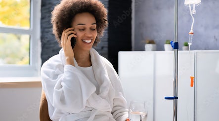 Woman enjoying IV therapy at IV DRIP LOUNGE BY SHAR in Walthamcross, England, GB.